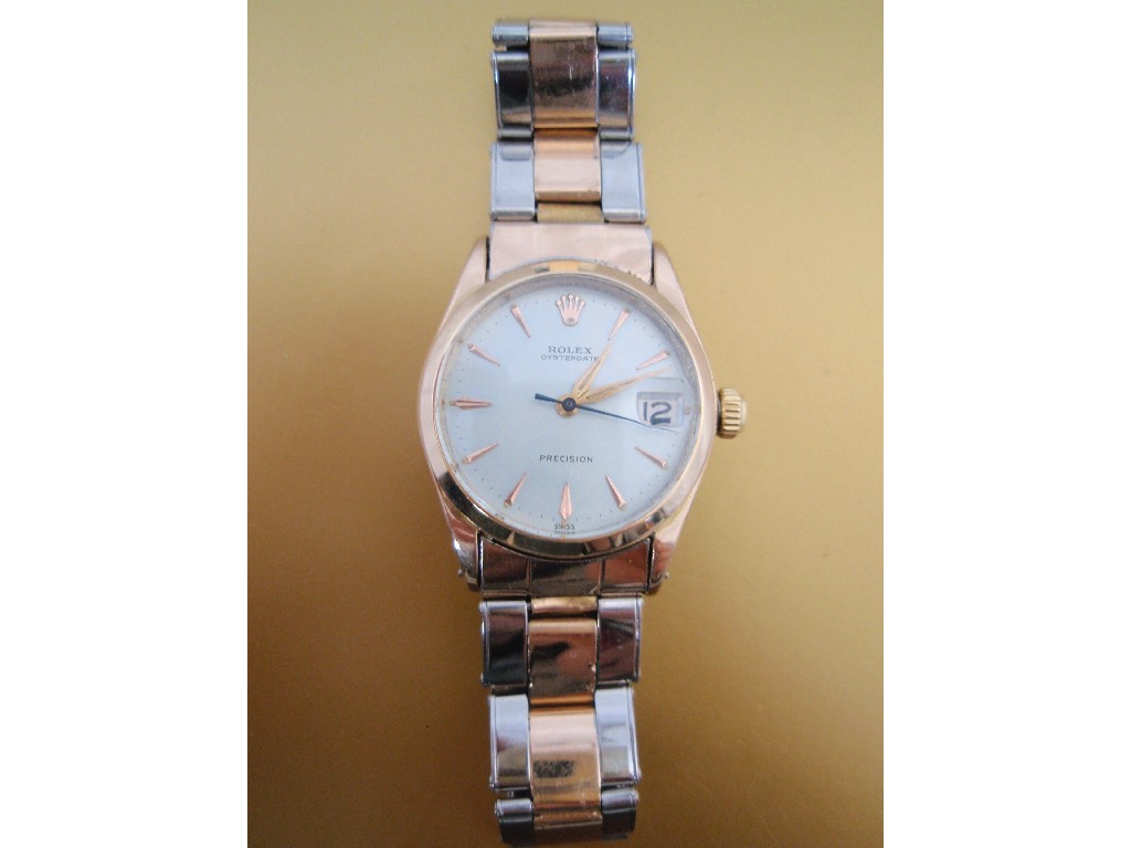 Appraisal: A mid size bi-colour metal bracelet wristwatch the dial marked