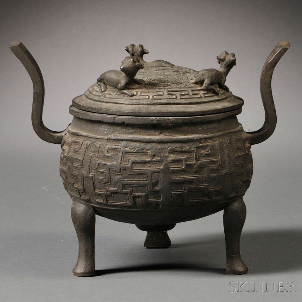 Appraisal: Archaic-style Bronze Tripod Covered Censer China the ovoid body cast