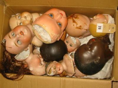 Appraisal: Twenty four dolls heads mostly German bisque including shoulder and