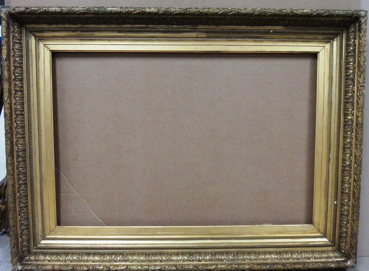 Appraisal: A th century gilt plaster frame with foliate decoration the