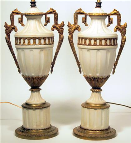 Appraisal: Large pair of French parian ware and gilt metal mounted