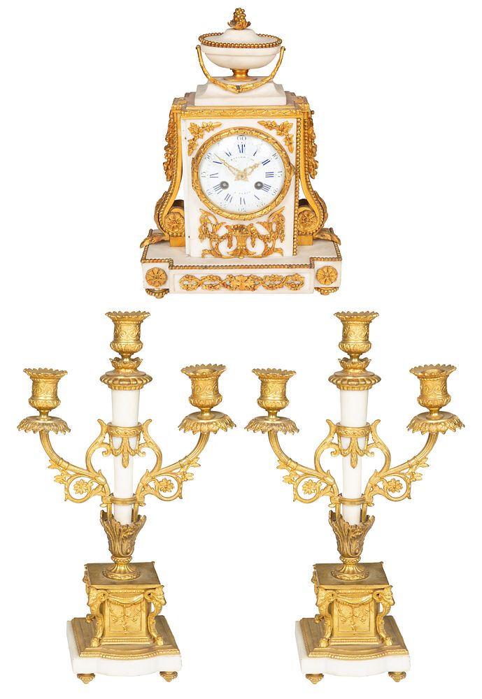 Appraisal: A THREE-PIECE FRENCH ORMOLU-MOUNTED MARBLE DESK CLOCK SET RAINGO FRERES