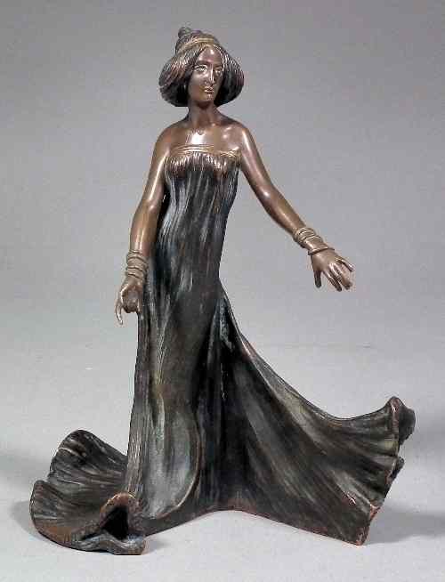 Appraisal: A Continental bronze figure of a dancing woman in flowing