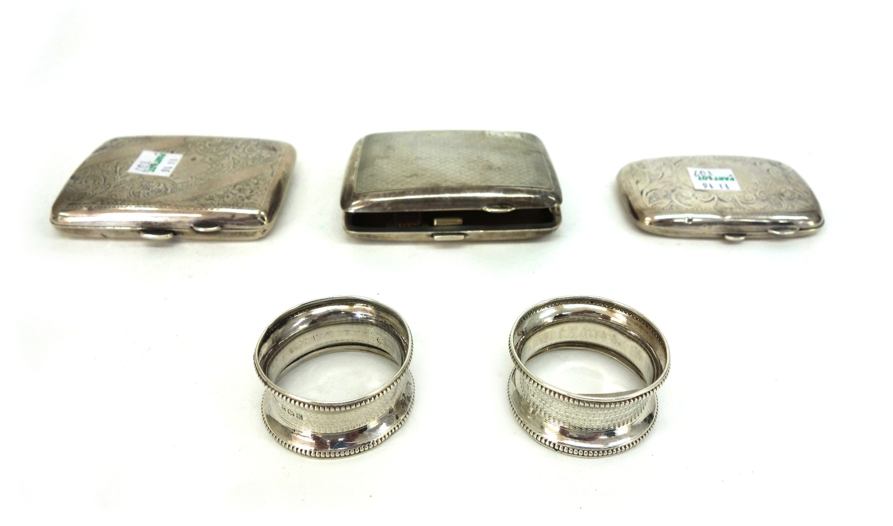 Appraisal: A pair of silver napkin rings Birmingham engine turned and