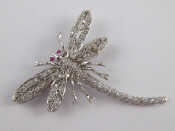 Appraisal: A white metal tests carat gold brooch designed as a