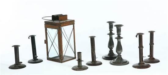 Appraisal: NINE LIGHTING DEVICES American th century Six hogscraper candlesticks two