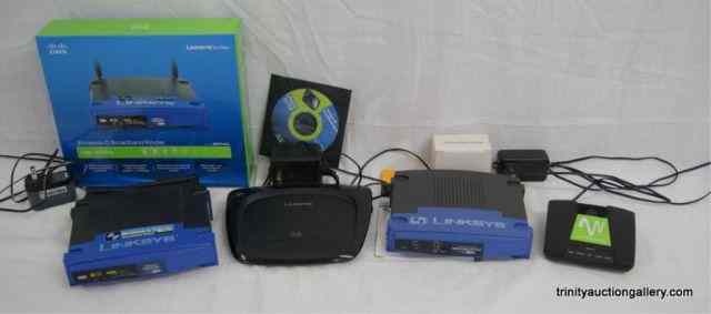 Appraisal: Lot of Linksys Routers Windstream ModemThis group consist of Linksys