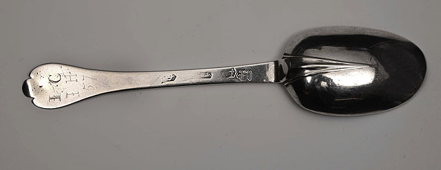 Appraisal: A QUEEN ANNE SILVER TREFID SPOON with rat tail London