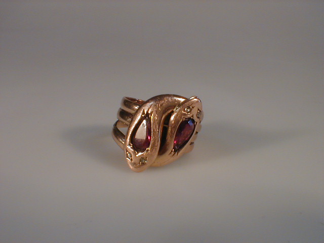 Appraisal: Gentleman's double head snake ring the heads set with shaped