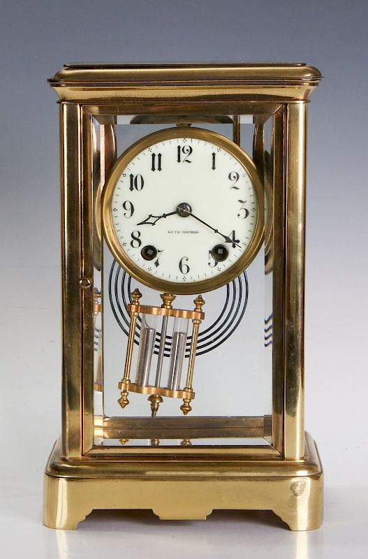 Appraisal: A SETH THOMAS CRYSTAL REGULATOR TABLE CLOCK The heavy gilt