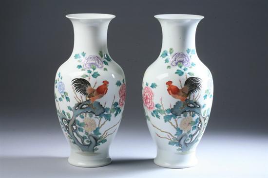 Appraisal: PAIR CHINESE FAMILLE ROSE COCKEREL PORCELAIN VASES Iron red The