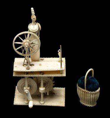 Appraisal: Miniature bone spinning jenny full-figured woman with dress and stacked