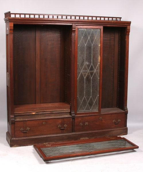 Appraisal: Mahogany bookcase with mullioned doors h to top of gallery