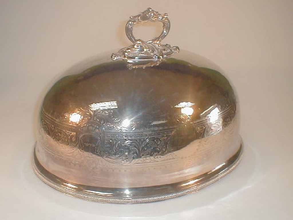 Appraisal: A Victorian Electroplate large meat cover with a rococo scroll