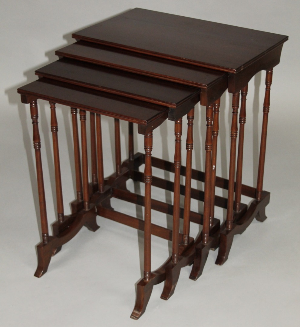 Appraisal: A thC mahogany nest of four tables each with rectangular