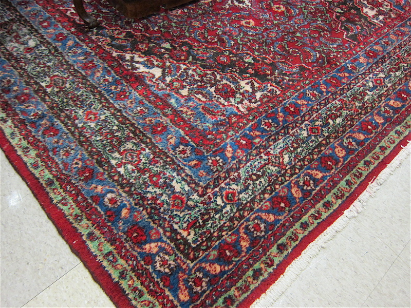 Appraisal: HAND KNOTTED PERSIAN CARPET central diamond-shaped medallion and overall Herati