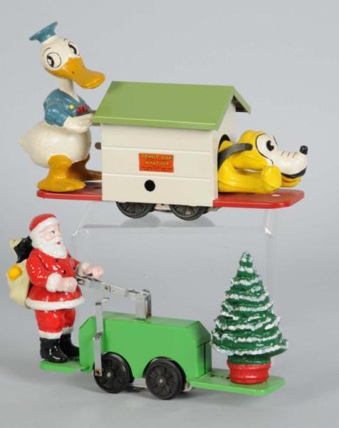 Appraisal: Lot of Disney Handcars Description Includes one Pride Line Santa