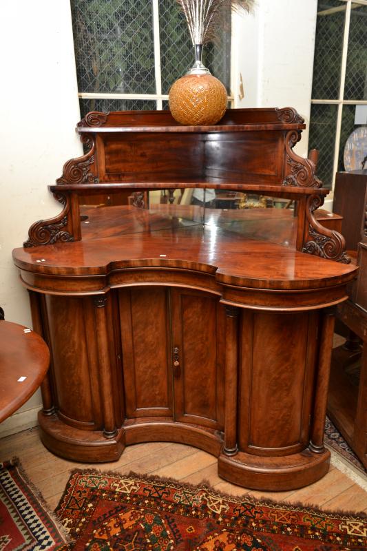 Appraisal: VICTORIAN SHAPED FLAME MAHOGANY CORNER SIDEBOARD VICTORIAN KIDNEY SHAPED FLAME