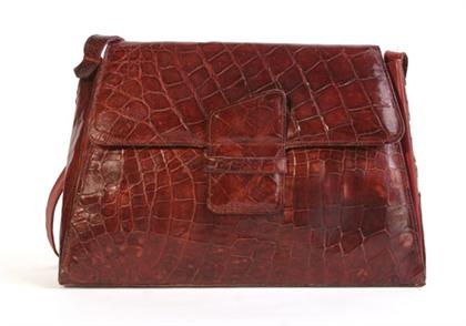 Appraisal: Red alligator purse s Front flap with slide-in geometric closure