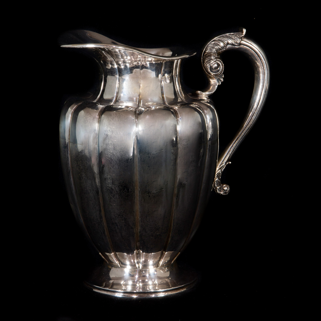 Appraisal: A MEXICAN SANBORN STERLING WATER PITCHER A Mexican Sanborn sterling