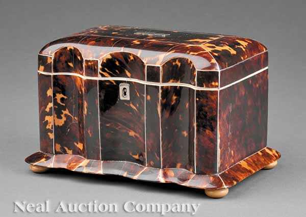 Appraisal: An English Tortoiseshell Tea Caddy early th c sarcophagus form