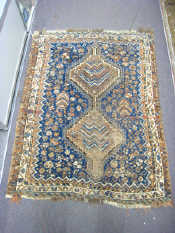 Appraisal: A large hand knotted Afghan rug x cm