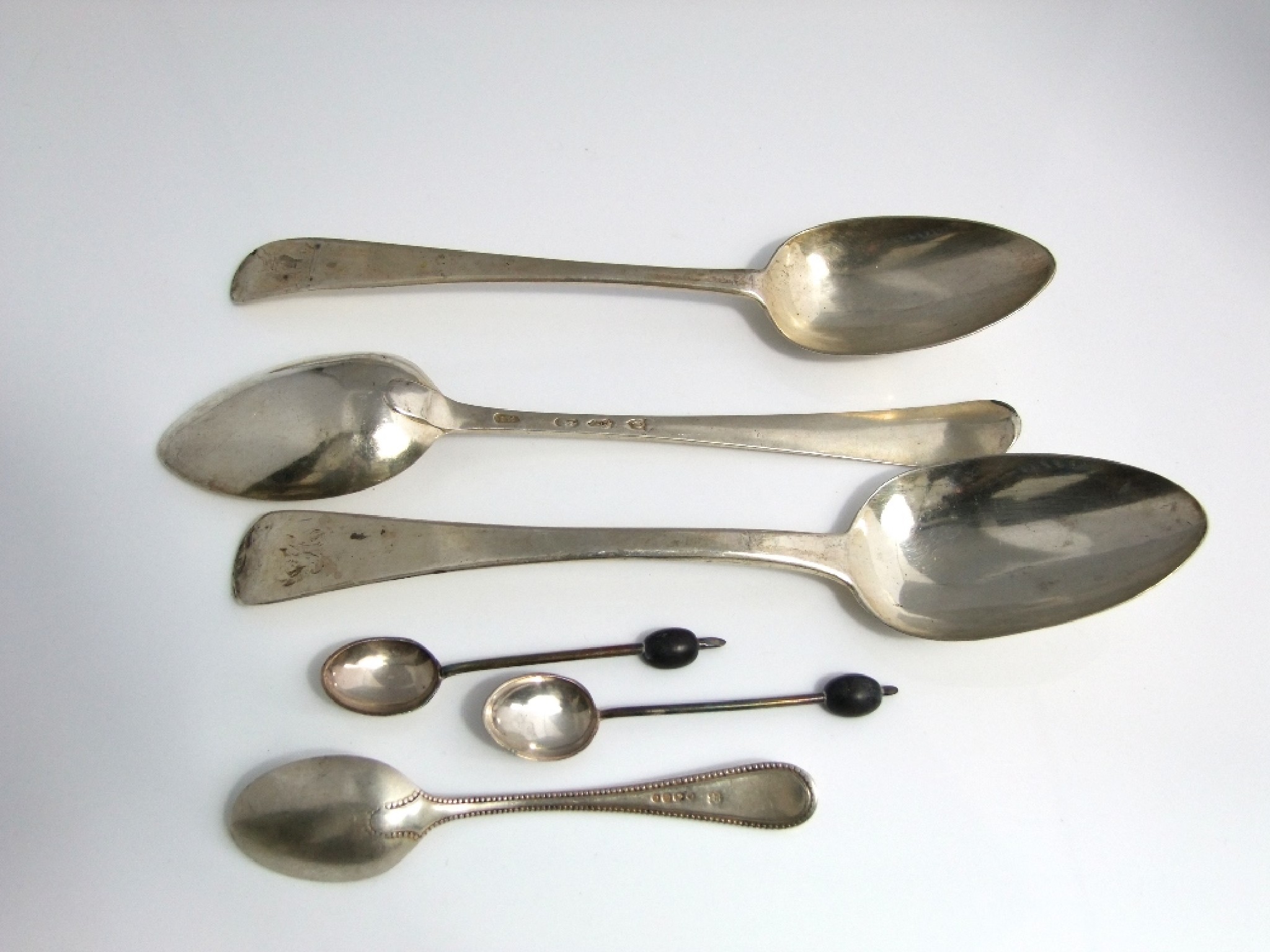 Appraisal: Three Georgian old English table spoons Dublin and and London