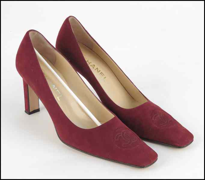 Appraisal: PAIR OF CHANEL BURGUNDY SUEDE HEELS With dustbags and box