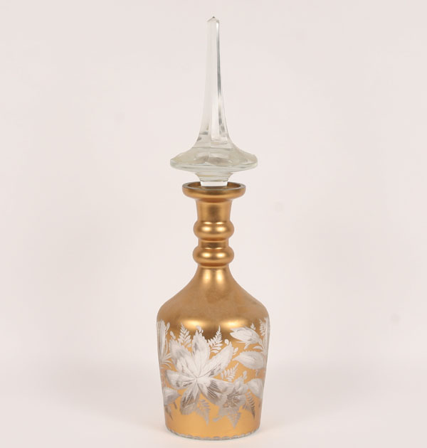 Appraisal: Large cut-to-clear Bohemian glass bottle with clear hexagonal stopper gilt