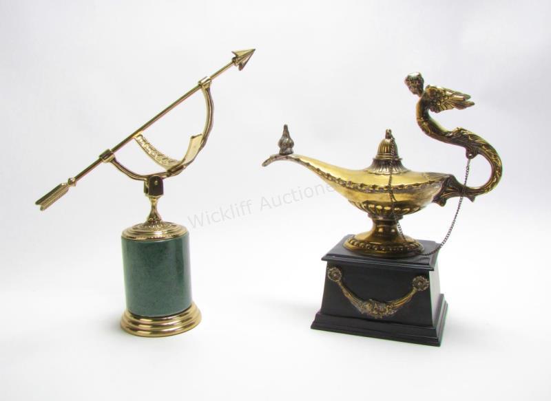 Appraisal: Two Metal Sculptures bow and arrow with brass lacquered finish