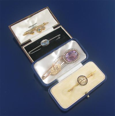 Appraisal: An oval amethyst and half pearl brooch a Royal Navy