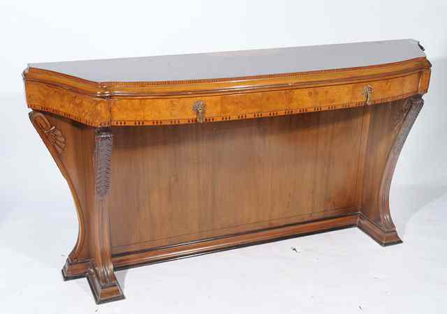 Appraisal: AN EARLY TO MID TH CENTURY WALNUT SERPENTINE FRONTED SIDEBOARD