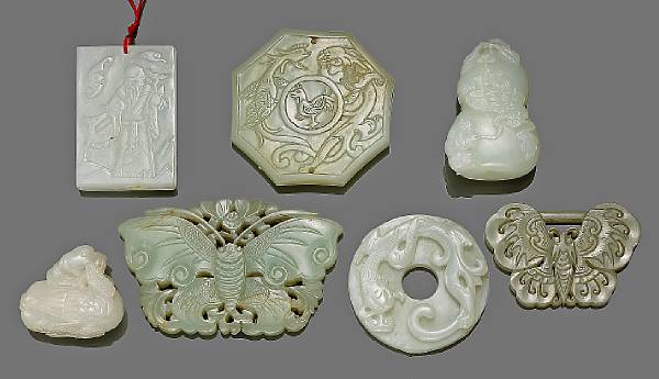 Appraisal: A group of seven small nephrite decorations th Century The