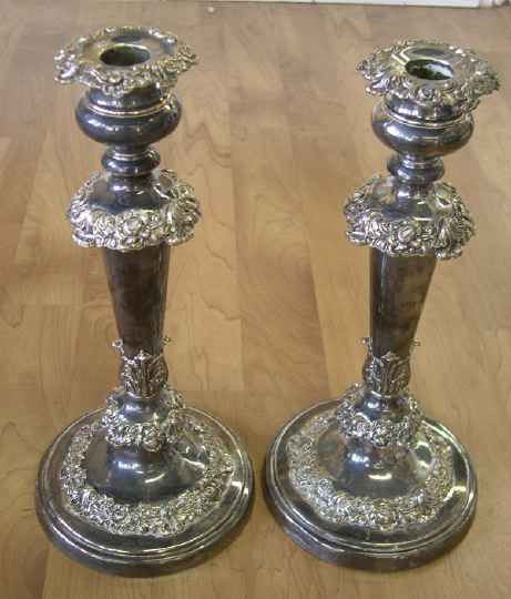 Appraisal: Attractive Pair of Antique Sheffield-Plate Candlesticks in Scroll-and-Flower decor second