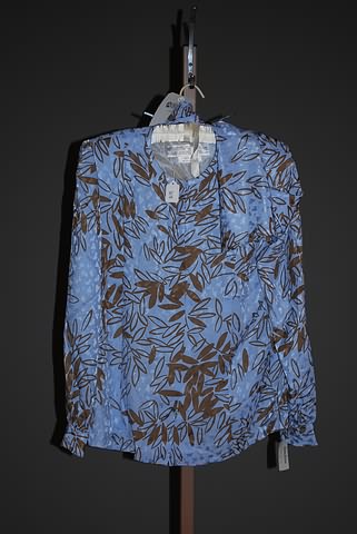 Appraisal: Andr Laug Light blue and brown long sleeve silk blouse