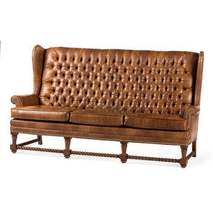 Appraisal: A Set of Leather Upholstered Button Tufted Wingback Sofas and