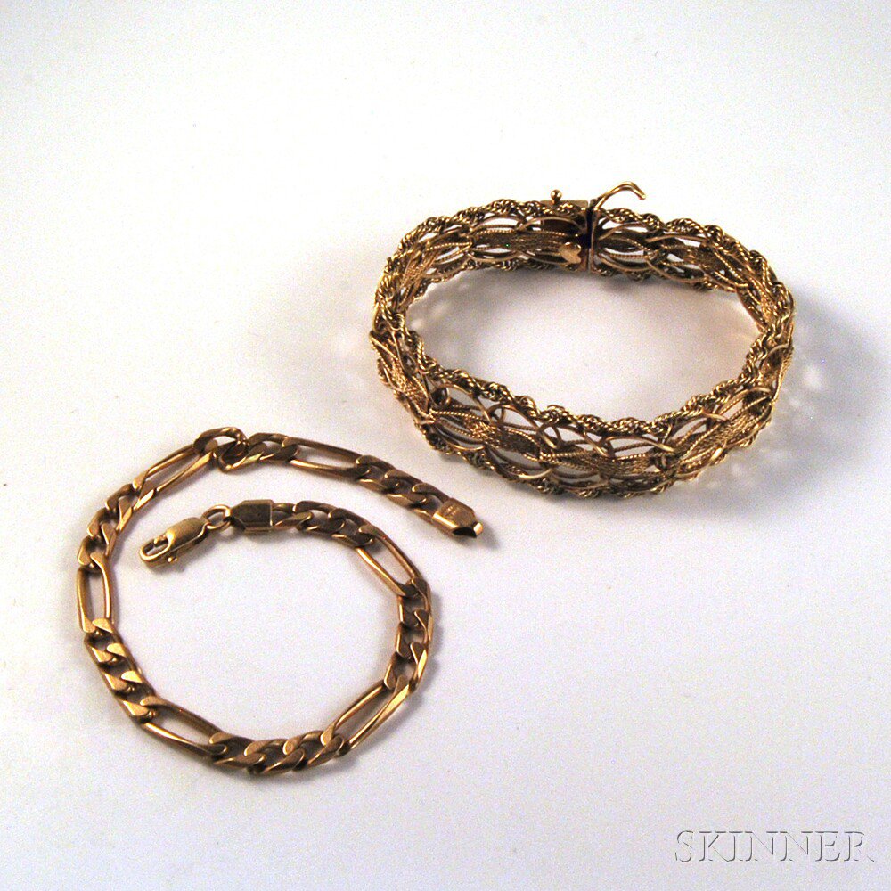 Appraisal: Two kt Gold Bracelets an Italian curb-link bracelet lg and