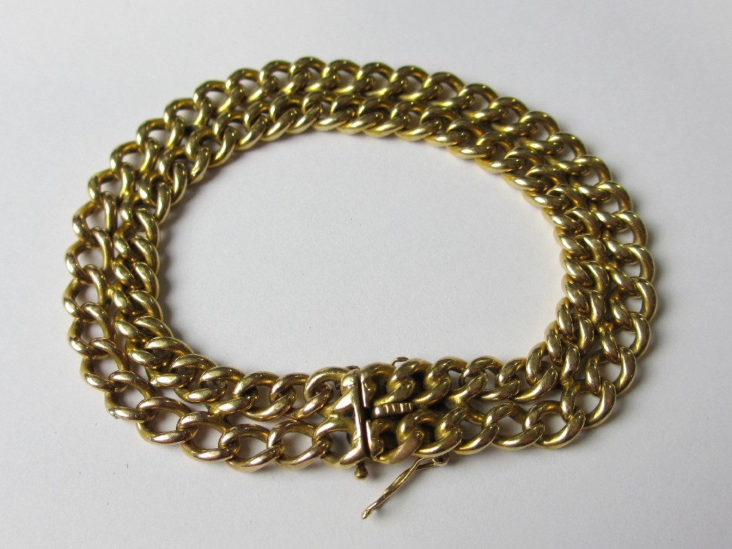 Appraisal: An eighteen carat gold curb link bracelet Approximately gms