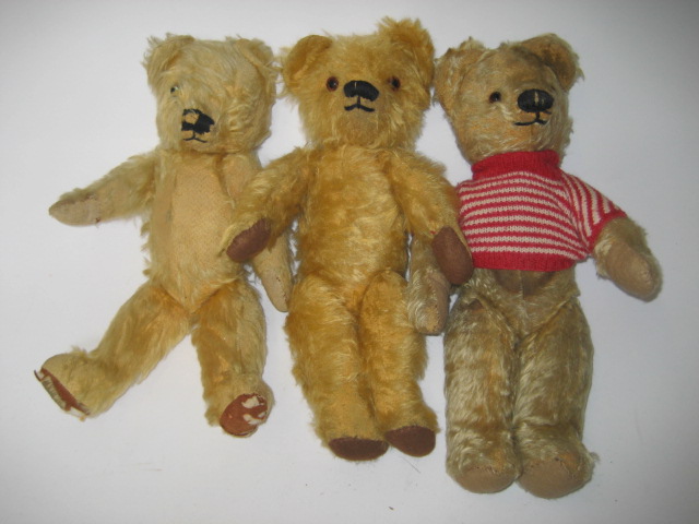 Appraisal: Three similar Chad Valley teddy bears covered in gold plush