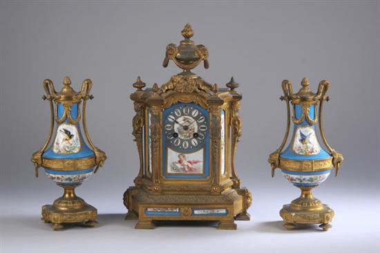 Appraisal: FRENCH THREE-PIECE GILT-BRONZE AND S VRES-STYLE PORCELAIN CLOCK GARNITURE late