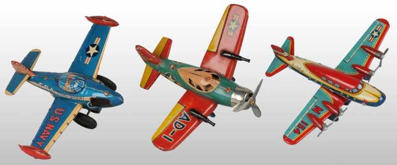 Appraisal: Lot of Tin Litho Airplane Friction Toys Description Japanese Working