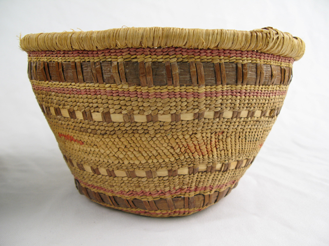 Appraisal: A NORTHWEST COASTAL INDIAN BASKET having a split cedar root