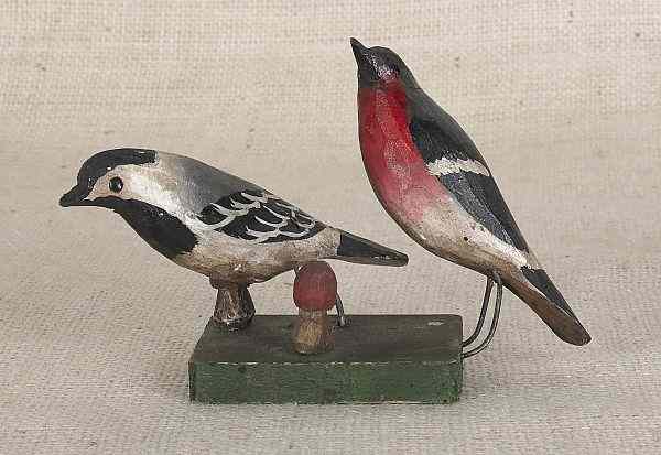 Appraisal: Two carved and painted song birds late th c signed