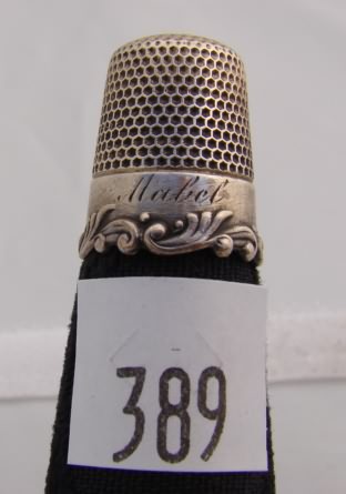 Appraisal: Thimble with vine design on band and engraved Mabel