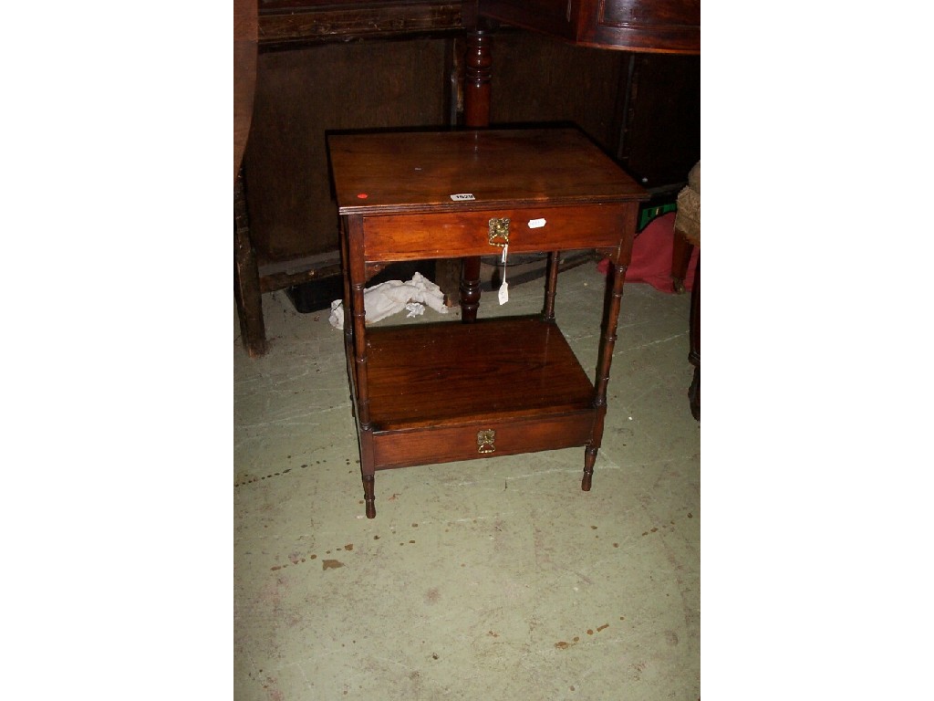 Appraisal: A small th century rosewood -tier side table on slender