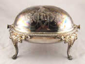 Appraisal: A Victorian silver plate swing over top breakfast dish