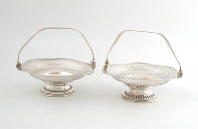 Appraisal: A pair of swing-handled silver baskets by S Blanckensee and