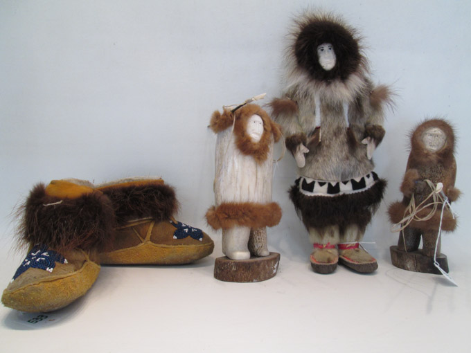 Appraisal: FOUR NORTHWEST NATIVE AMERICAN ITEMS two bone and fur carvings