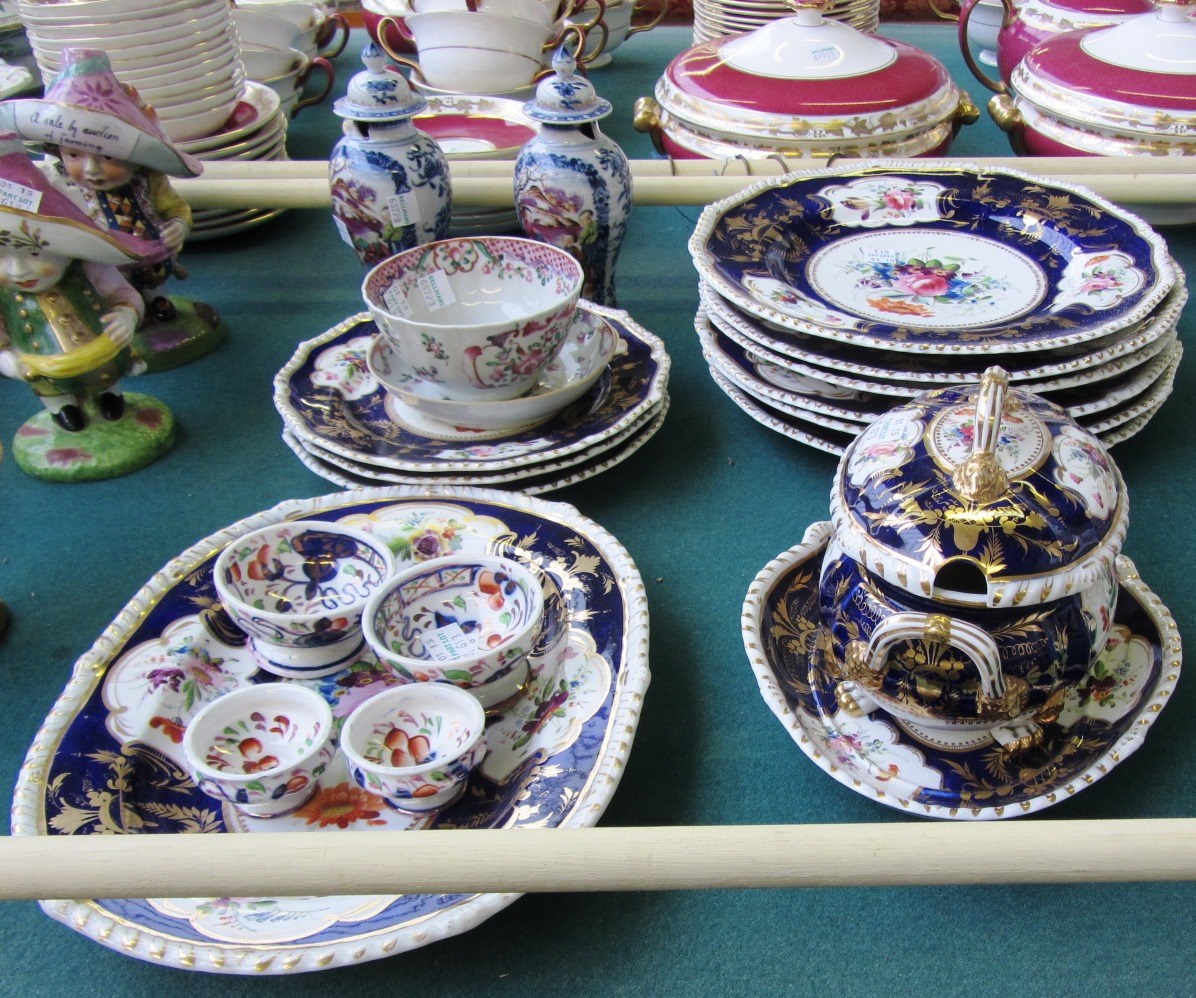 Appraisal: A Derby part dinner service th century decorated with flowers