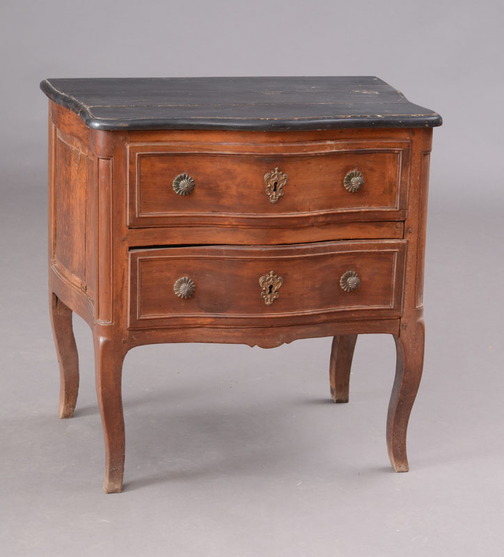 Appraisal: LOUIS XV PROVINCIAL EBONIZED AND FRUITWOOD SMALL COMMODE The serpentine-fronted